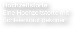  Hochzeitstorte
 Eine Hochzeitstorte mit 
 Schleierkraut dekoriert